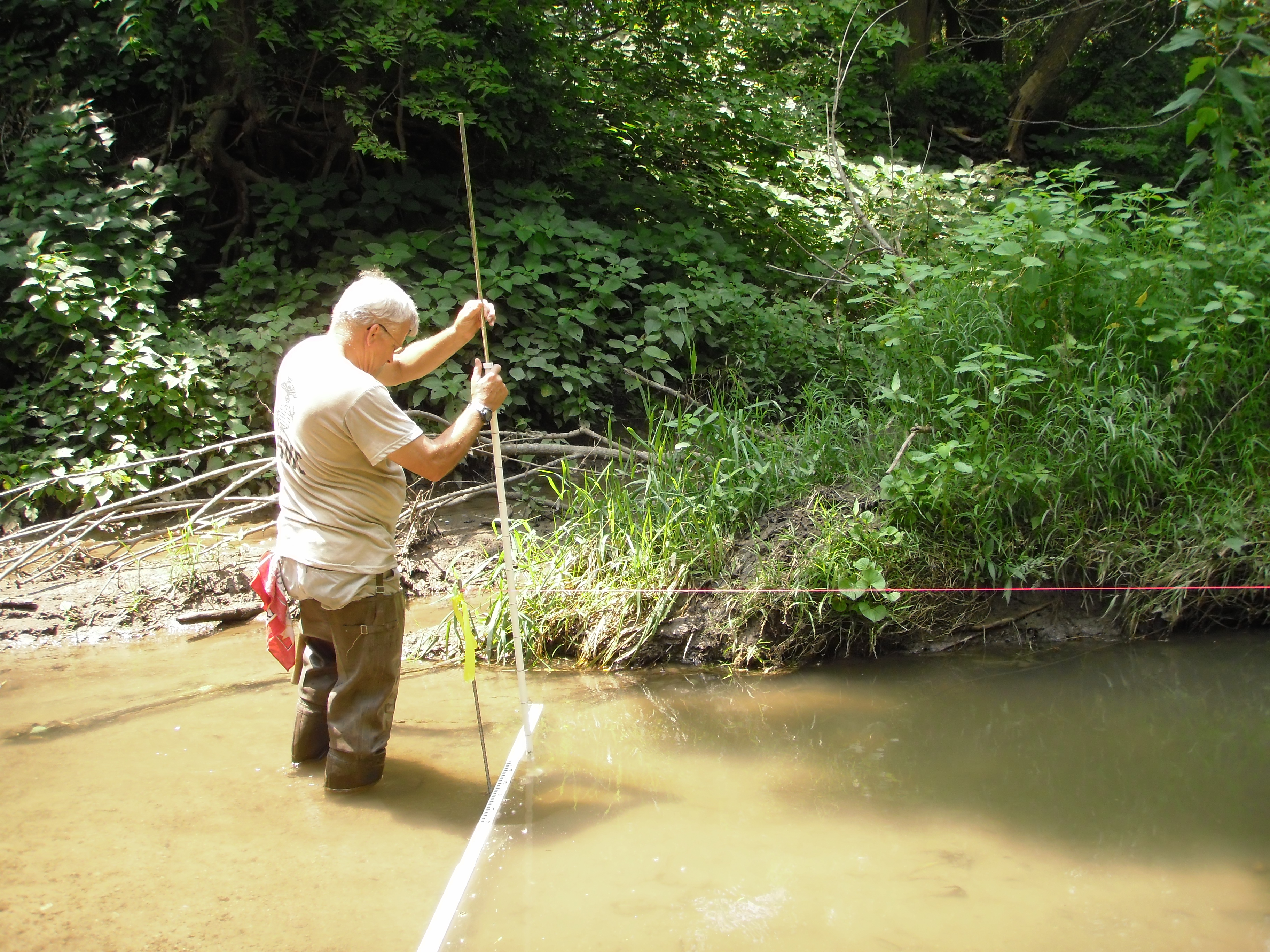 Measuring sediment depth on Banner Creek, July 2010.